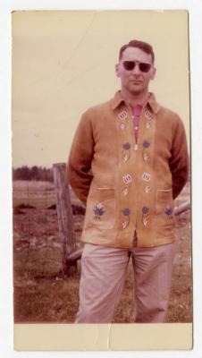 Photograph of man in leather jacket