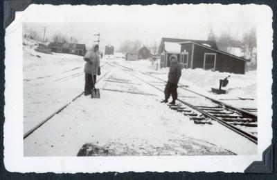 Photo album pp. 35-36 : A Northern funeral and a Peterbell home