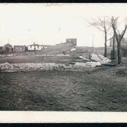 Photographs of a northern highway/Blind River, receipts for monthly allowance, and
      banking book