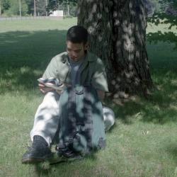 Photographs of students by the chapel
