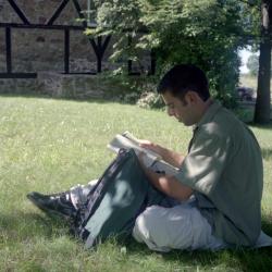 Photographs of students by the chapel