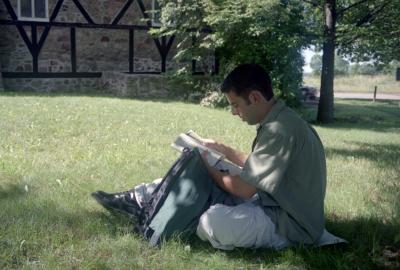 Photographs of students by the chapel