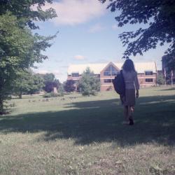 Photographs of students by the chapel