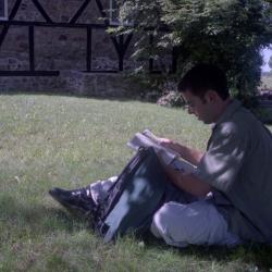 Photographs of students by the chapel