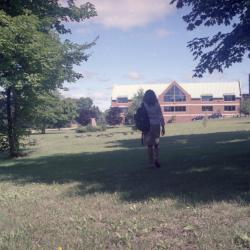Photographs of students by the chapel